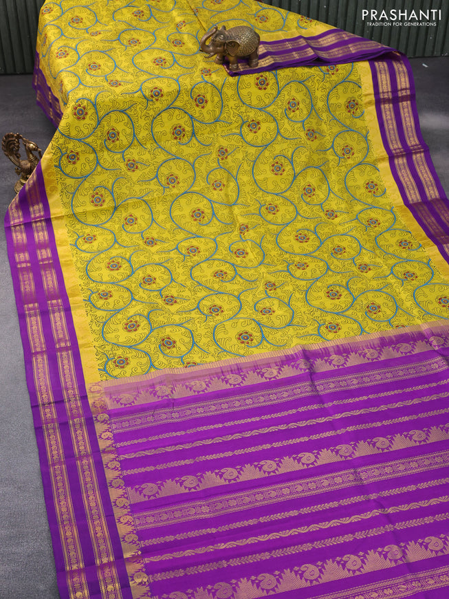 Silk cotton saree lime yellow and purple with allover kalamkari prints and rettapet zari woven korvai border