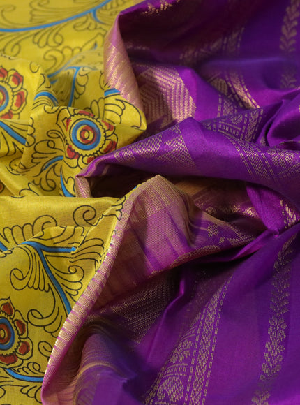 Silk cotton saree lime yellow and purple with allover kalamkari prints and rettapet zari woven korvai border