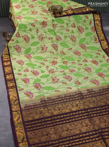 Silk cotton saree pista green and wine shade with allover kalamkari prints and zari woven korvai border