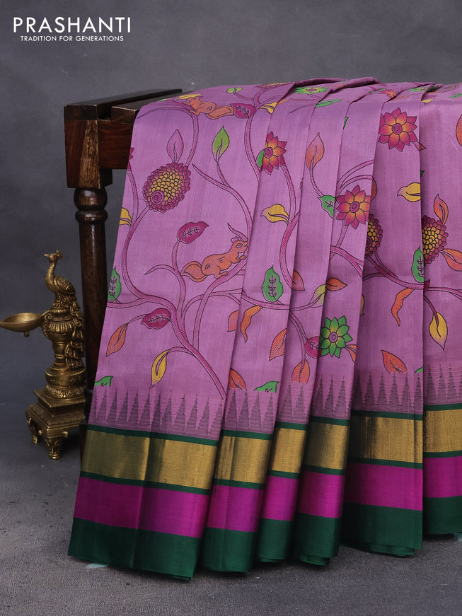 Silk cotton saree lavender shade and bottle green with allover kalamkari prints and temple deisgn zari woven korvai border