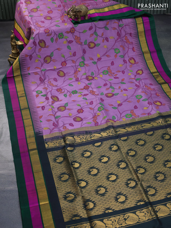 Silk cotton saree lavender shade and bottle green with allover kalamkari prints and temple deisgn zari woven korvai border