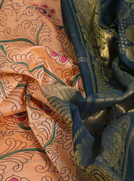 Silk cotton saree pale orange and green with allover kalamkari prints and temple deisgn zari woven simple border