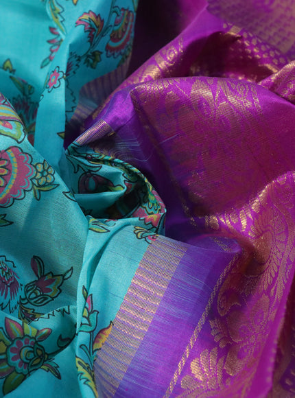 Silk cotton saree light blue and purple with allover kalamkari prints and temple deisgn zari woven simple border