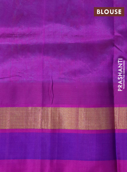 Silk cotton saree light blue and purple with allover kalamkari prints and temple deisgn zari woven simple border