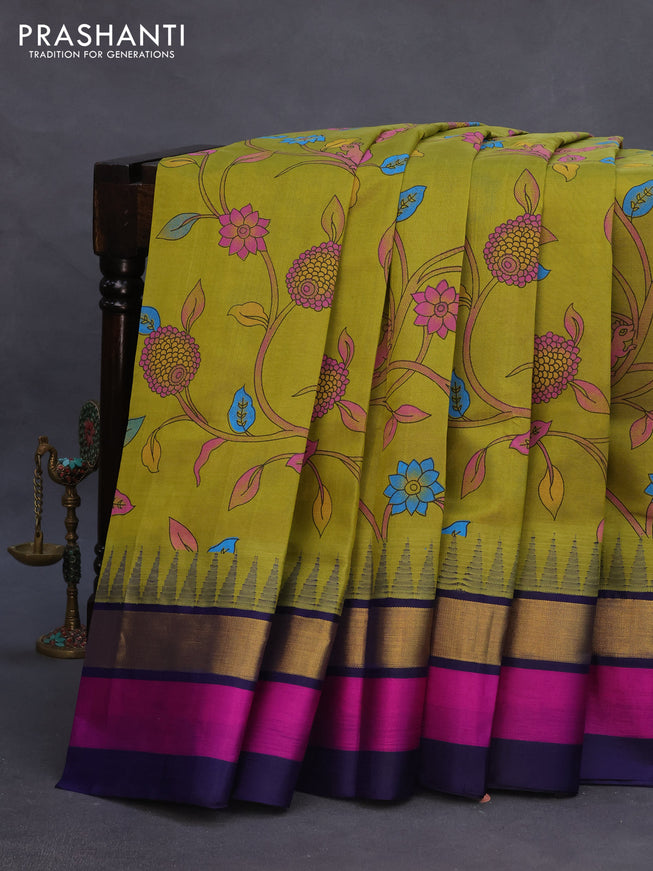 Silk cotton saree lime green and blue with allover kalamkari prints and temple deisgn zari woven simple border