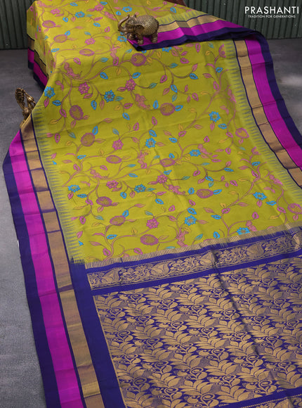 Silk cotton saree lime green and blue with allover kalamkari prints and temple deisgn zari woven simple border