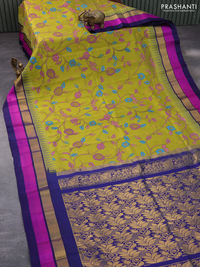 Silk cotton saree lime green and blue with allover kalamkari prints and temple deisgn zari woven simple border