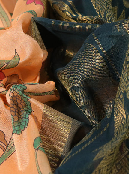 Silk cotton saree pale orange and green with allover kalamkari prints and temple deisgn zari woven simple border