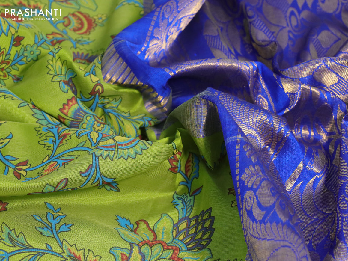 Silk cotton saree light green and blue with allover kalamkari prints and temple deisgn zari woven simple border