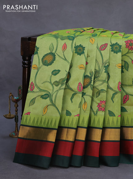 Silk cotton saree pastel green and dark green with allover kalamkari prints and temple deisgn zari woven simple border