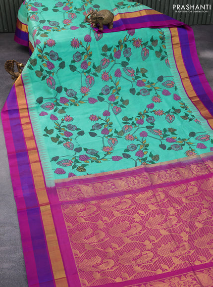 Silk cotton saree teal blue and magenta pink with allover kalamkari prints and temple deisgn zari woven simple border