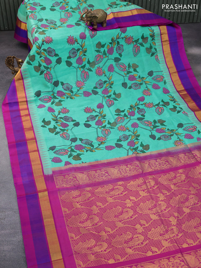 Silk cotton saree teal blue and magenta pink with allover kalamkari prints and temple deisgn zari woven simple border