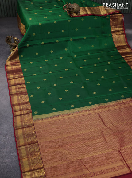 Pure kanchipuram silk saree green and maroon with zari woven buttas and zari woven border