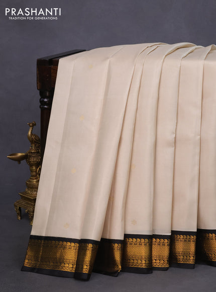 Pure kanchipuram silk saree cream and black with zari woven buttas and zari woven korvai border