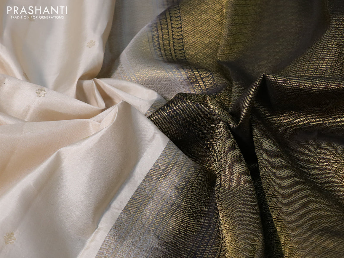 Pure kanchipuram silk saree cream and black with zari woven buttas and zari woven korvai border