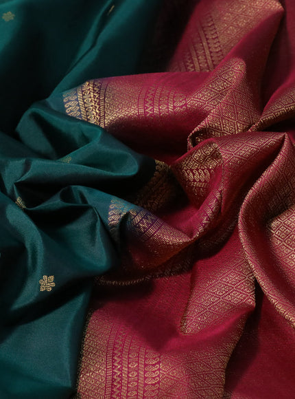 Pure kanchipuram silk saree dark green and dark magenta pink with zari woven buttas and zari woven korvai border