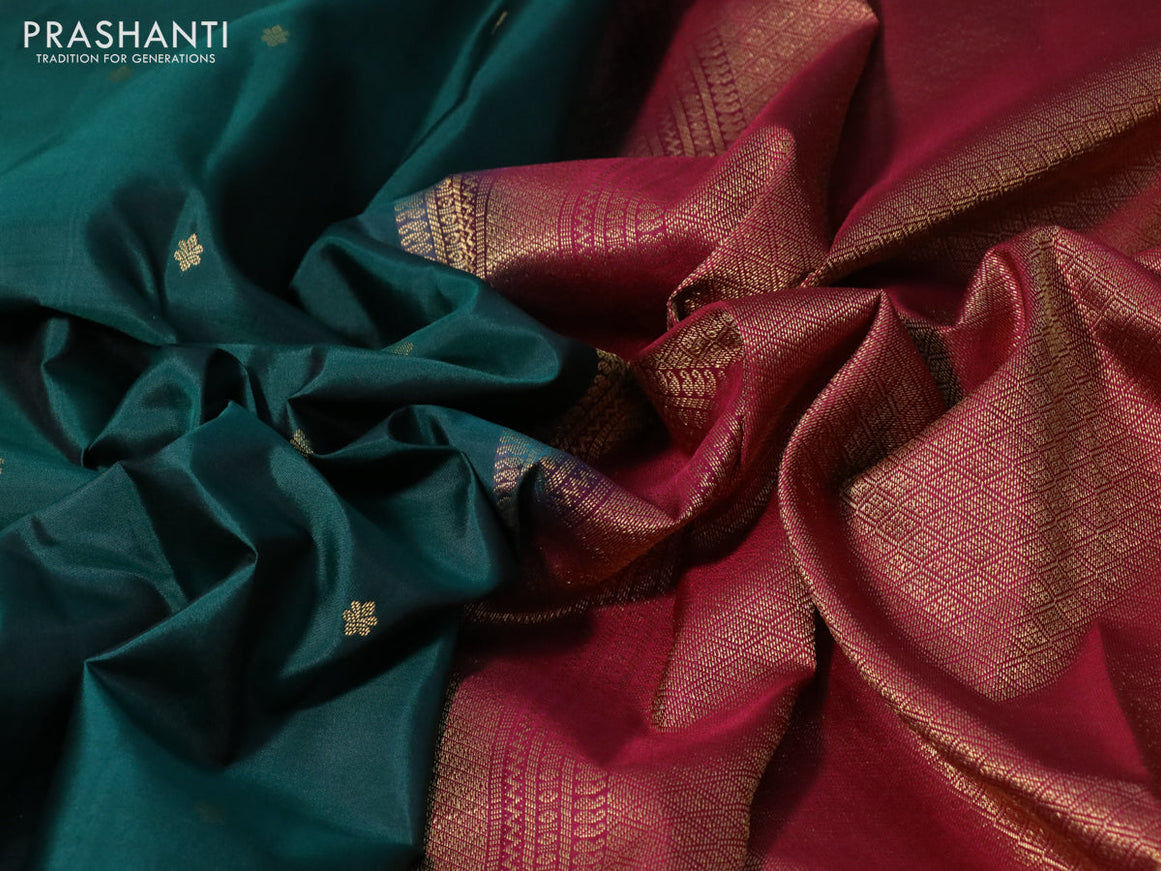 Pure kanchipuram silk saree dark green and dark magenta pink with zari woven buttas and zari woven korvai border