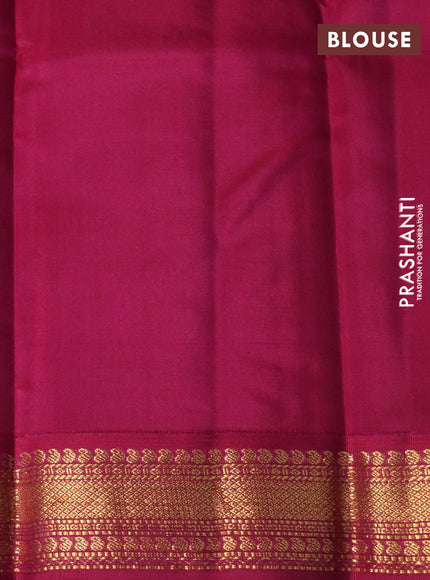 Pure kanchipuram silk saree dark green and dark magenta pink with zari woven buttas and zari woven korvai border