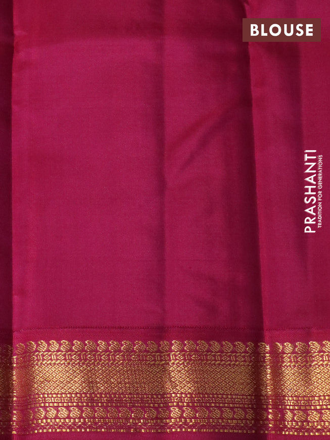 Pure kanchipuram silk saree dark green and dark magenta pink with zari woven buttas and zari woven korvai border