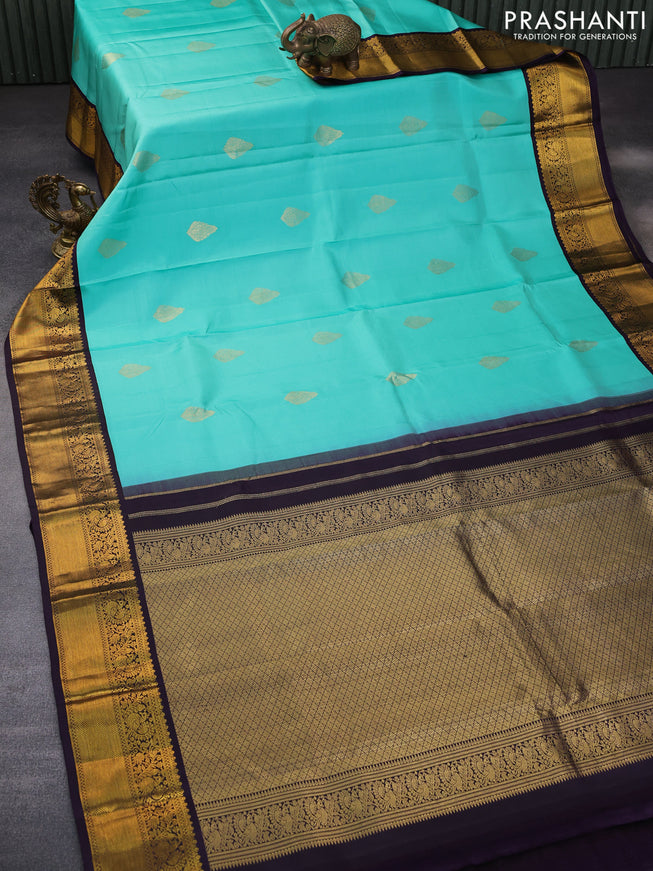 Pure kanchipuram silk saree teal green shade and jamun shade with zari woven buttas and zari woven korvai border