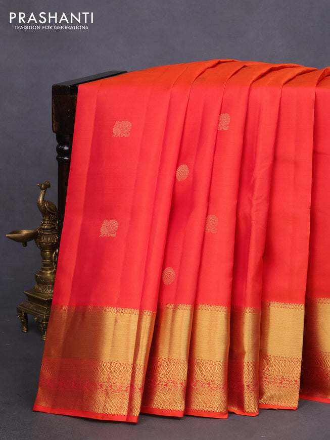 Pure kanchipuram silk saree dual shade of orange and teal blue with zari woven buttas and long zari woven border