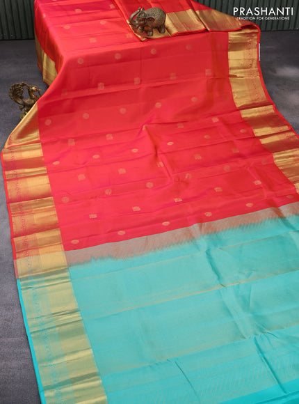 Pure kanchipuram silk saree dual shade of orange and teal blue with zari woven buttas and long zari woven border