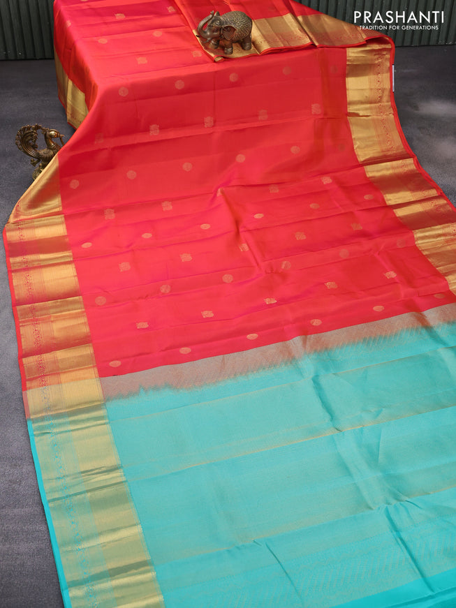 Pure kanchipuram silk saree dual shade of orange and teal blue with zari woven buttas and long zari woven border