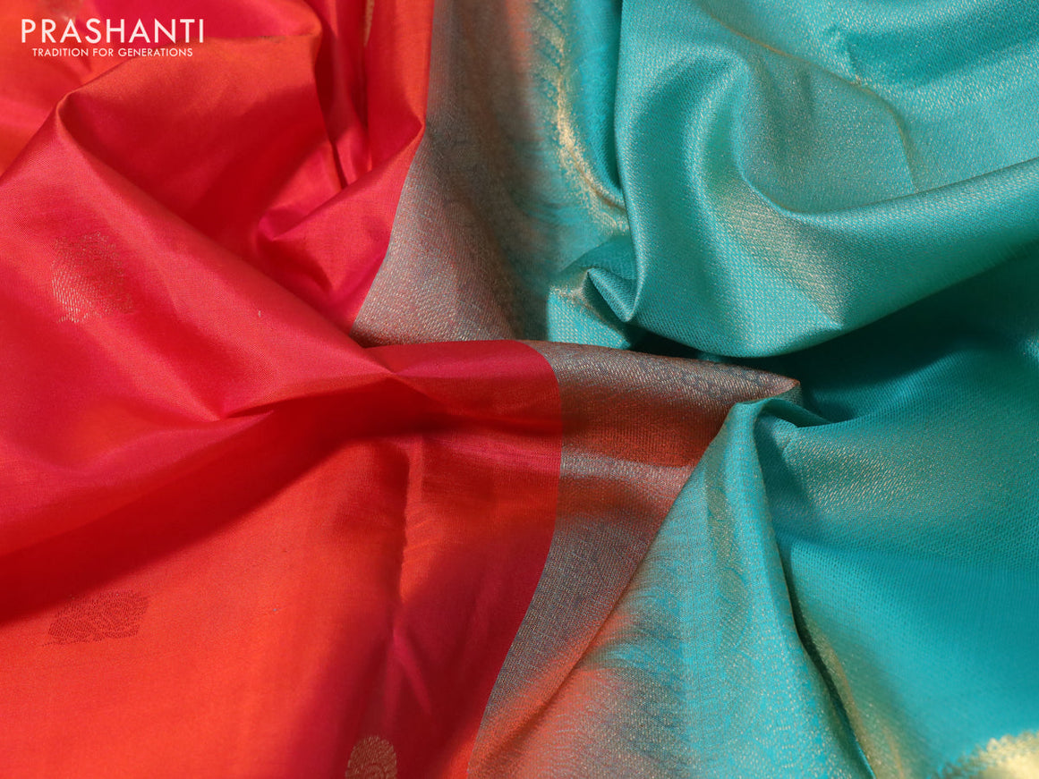 Pure kanchipuram silk saree dual shade of orange and teal blue with zari woven buttas and long zari woven border