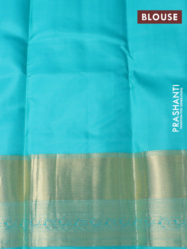 Pure kanchipuram silk saree dual shade of orange and teal blue with zari woven buttas and long zari woven border