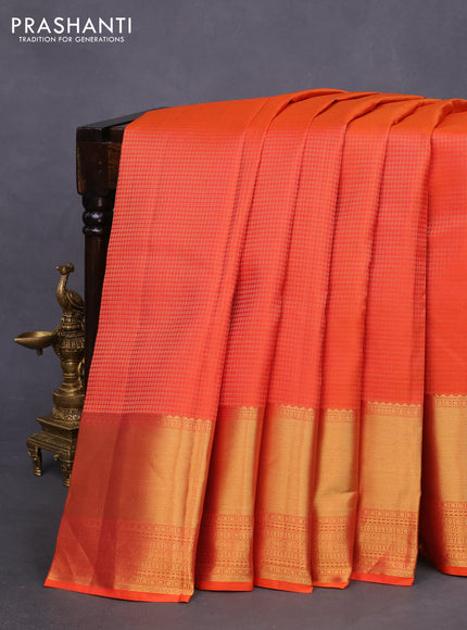 Pure kanchipuram silk saree dual shade of orange and teal blue with allover zari checked pattern and zari woven border