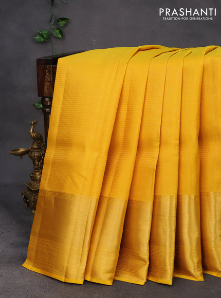 Pure kanchipuram silk saree mustard yellow and pink with allover zari checked pattern and zari woven border