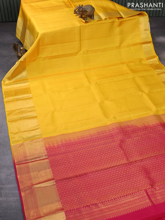 Pure kanchipuram silk saree mustard yellow and pink with allover zari checked pattern and zari woven border