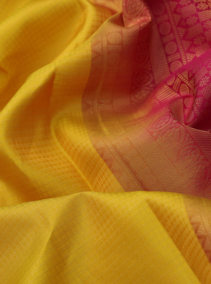 Pure kanchipuram silk saree mustard yellow and pink with allover zari checked pattern and zari woven border