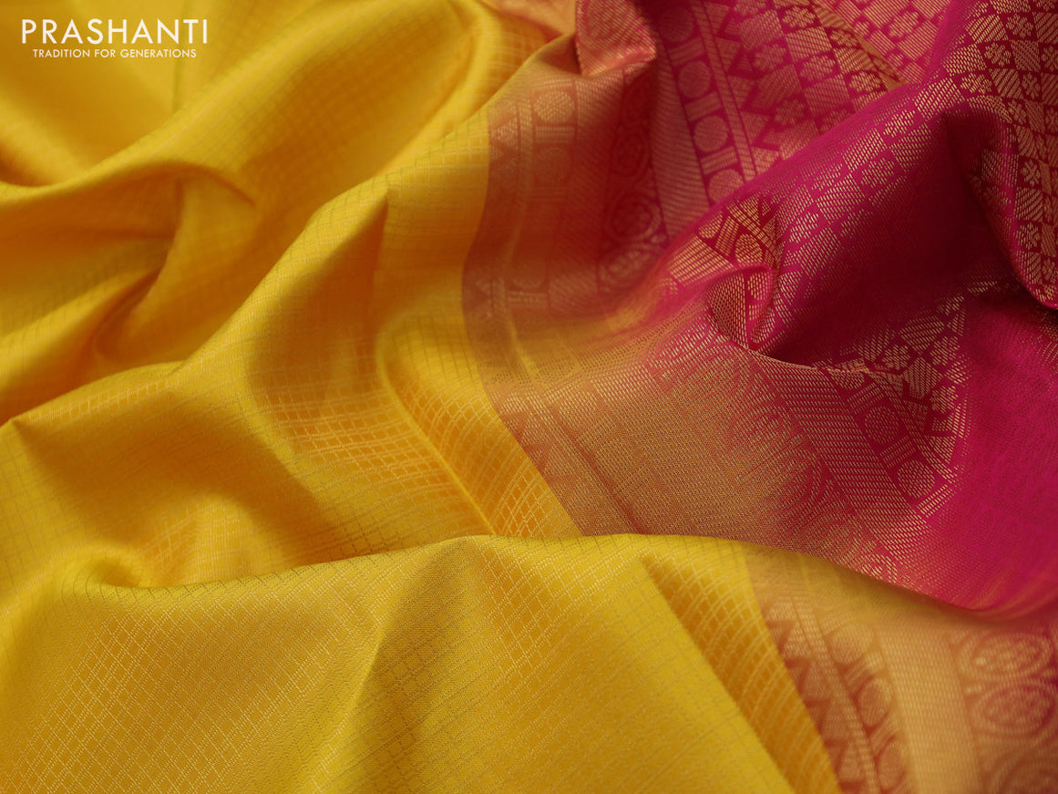 Pure kanchipuram silk saree mustard yellow and pink with allover zari checked pattern and zari woven border