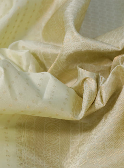 Pure kanchipuram silk saree cream with allover zari woven butta weaves and zari woven border