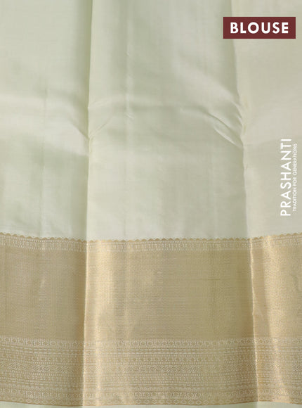 Pure kanchipuram silk saree cream with allover zari woven butta weaves and zari woven border