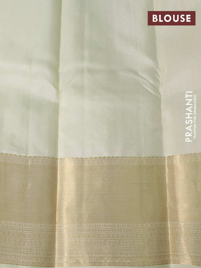 Pure kanchipuram silk saree cream with allover zari woven butta weaves and zari woven border