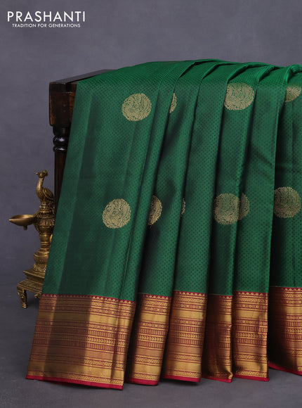 Pure kanchipuram silk saree green and pink with allover self emboss & zari buttas and zari woven border