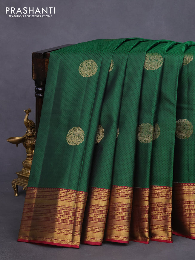 Pure kanchipuram silk saree green and pink with allover self emboss & zari buttas and zari woven border