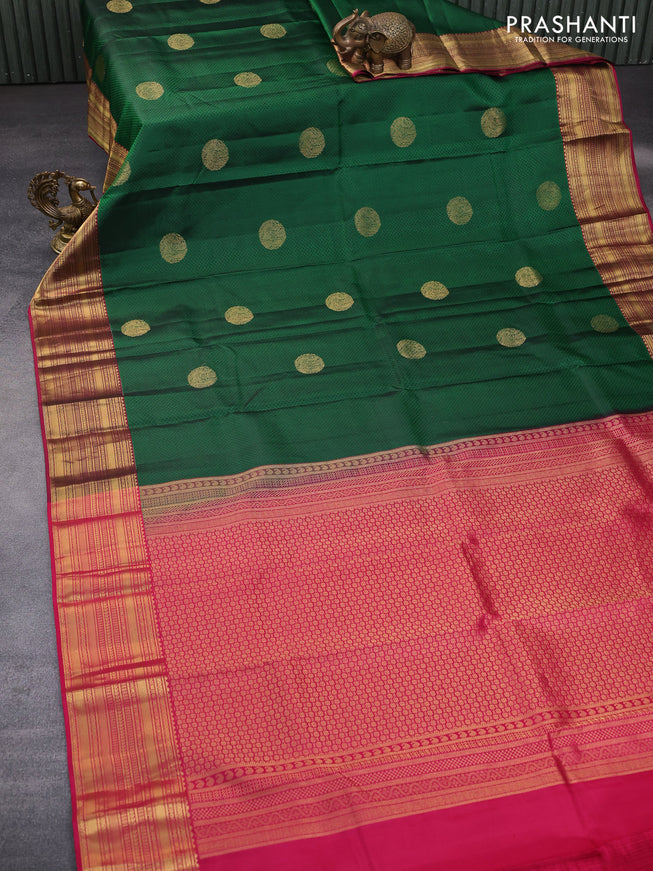 Pure kanchipuram silk saree green and pink with allover self emboss & zari buttas and zari woven border