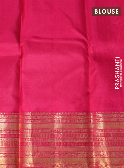 Pure kanchipuram silk saree green and pink with allover self emboss & zari buttas and zari woven border