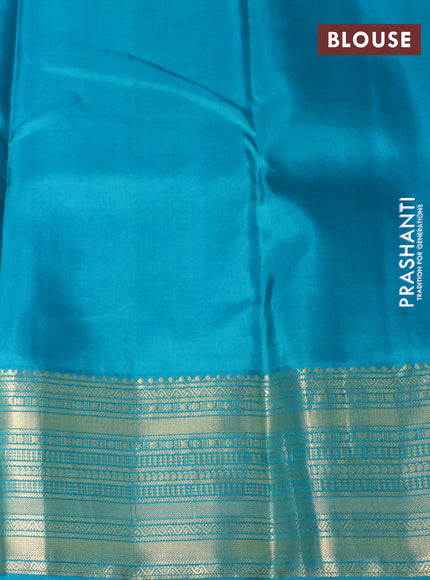 Pure kanchipuram silk saree blue and teal green with allover self emboss & zari buttas and zari woven border