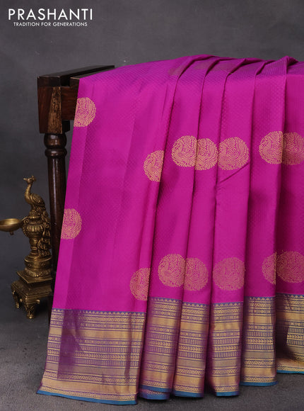 Pure kanchipuram silk saree purple and teal green with allover self emboss & zari buttas and zari woven border