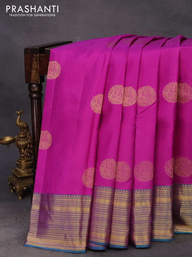 Pure kanchipuram silk saree purple and teal green with allover self emboss & zari buttas and zari woven border