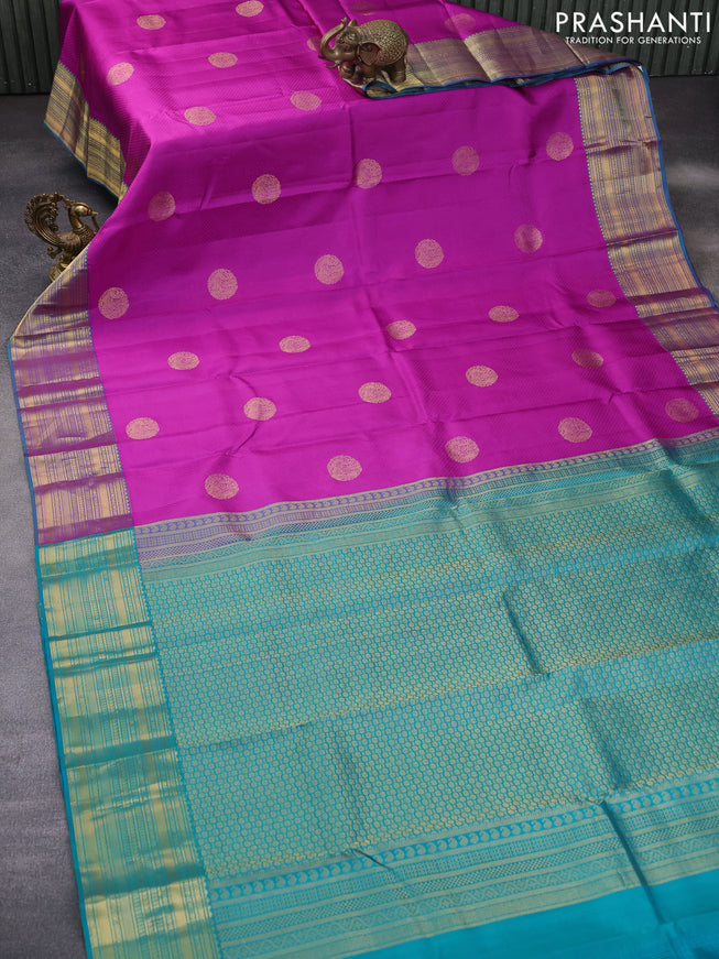 Pure kanchipuram silk saree purple and teal green with allover self emboss & zari buttas and zari woven border