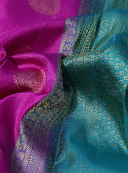 Pure kanchipuram silk saree purple and teal green with allover self emboss & zari buttas and zari woven border