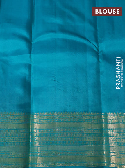 Pure kanchipuram silk saree purple and teal green with allover self emboss & zari buttas and zari woven border