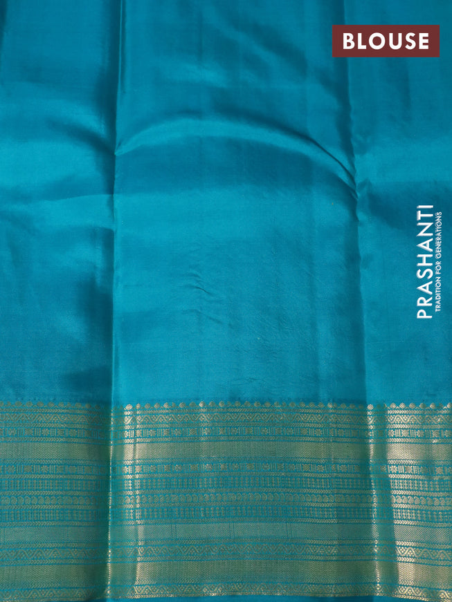 Pure kanchipuram silk saree purple and teal green with allover self emboss & zari buttas and zari woven border