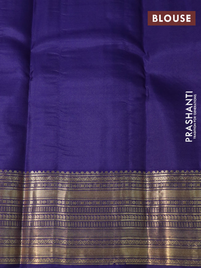 Pure kanchipuram silk saree red and blue with allover self emboss & zari buttas and zari woven border