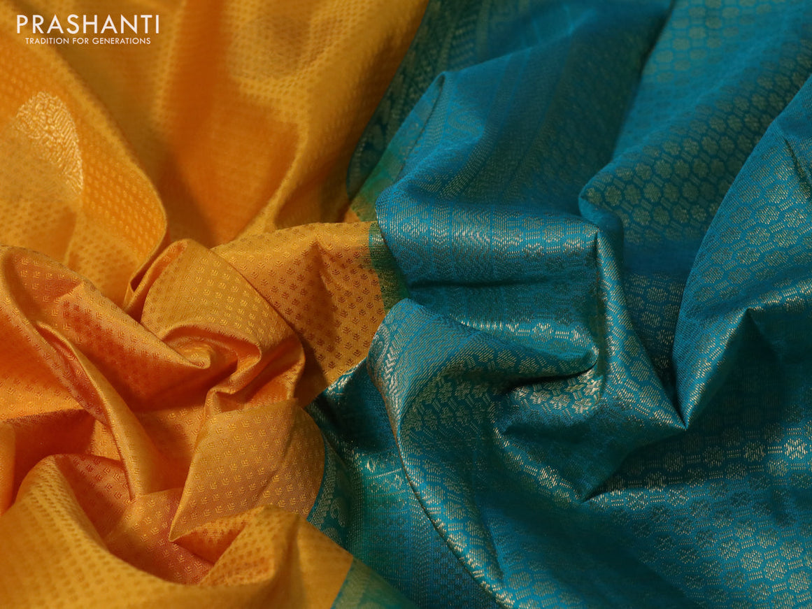 Pure kanchipuram silk saree mustard yellow and teal blue with allover self emboss & zari buttas and zari woven border